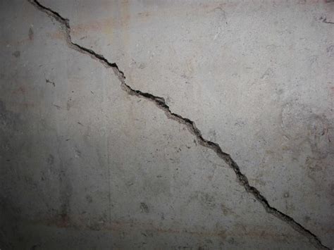 metal bracket concrete crack|concrete wall cracks.